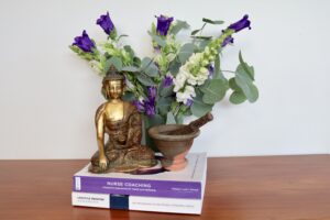 Blue flowers and Buddha